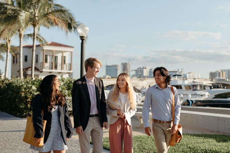 master of business administration mba students walk near the intercoastal waterway in 西<a href='http://xm8.comprarargan.com/'>推荐全球最大网赌正规平台欢迎您</a>.